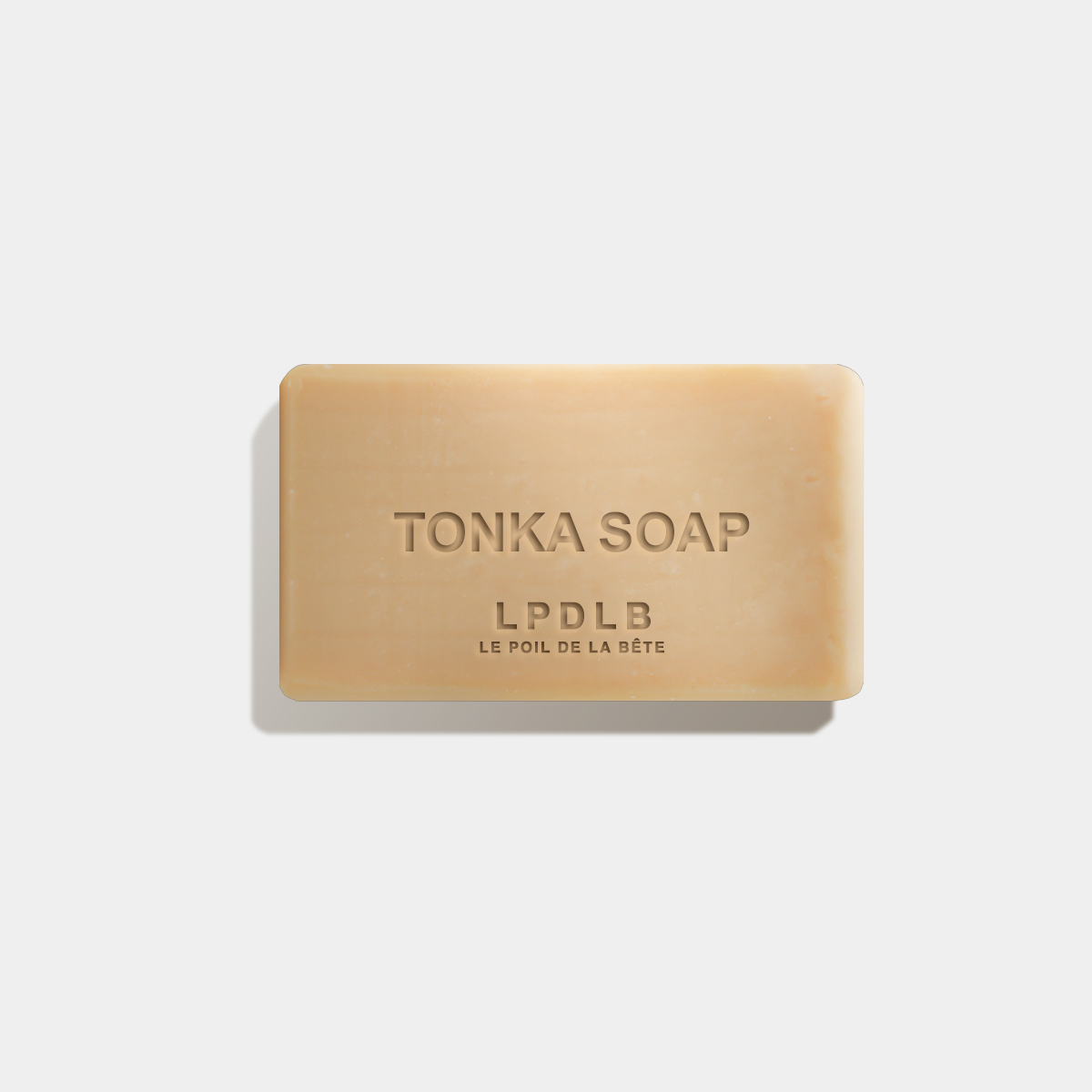 Savon pour le corps et le visage à l'odeur de la fêve de tonka.